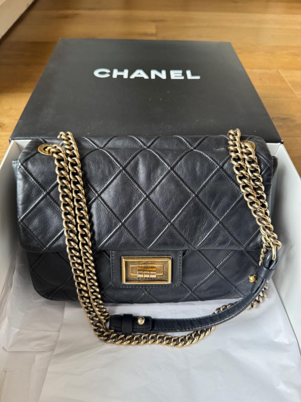CHANEL Black Quilted Leather Shoulder Bag with Gold Chain Hardware